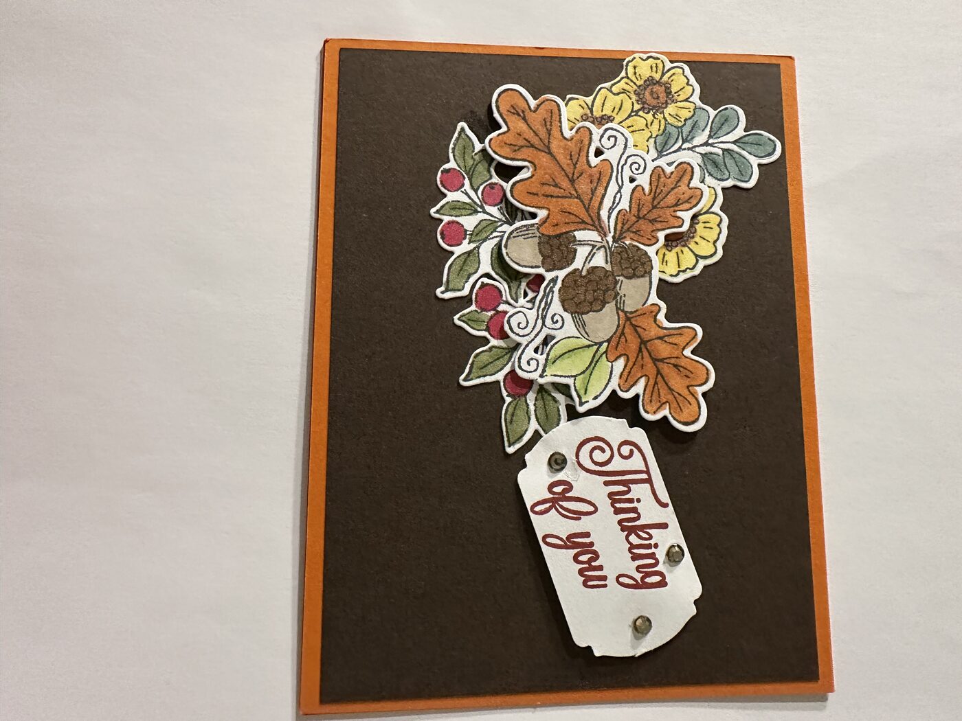 Autumn acorn and floral bouquet card with "thinking of you" tag